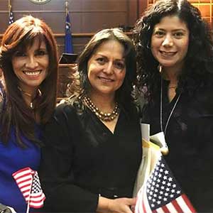 Lizeth Ramirez-Barroeta with her colleagues at her naturalization ceremony